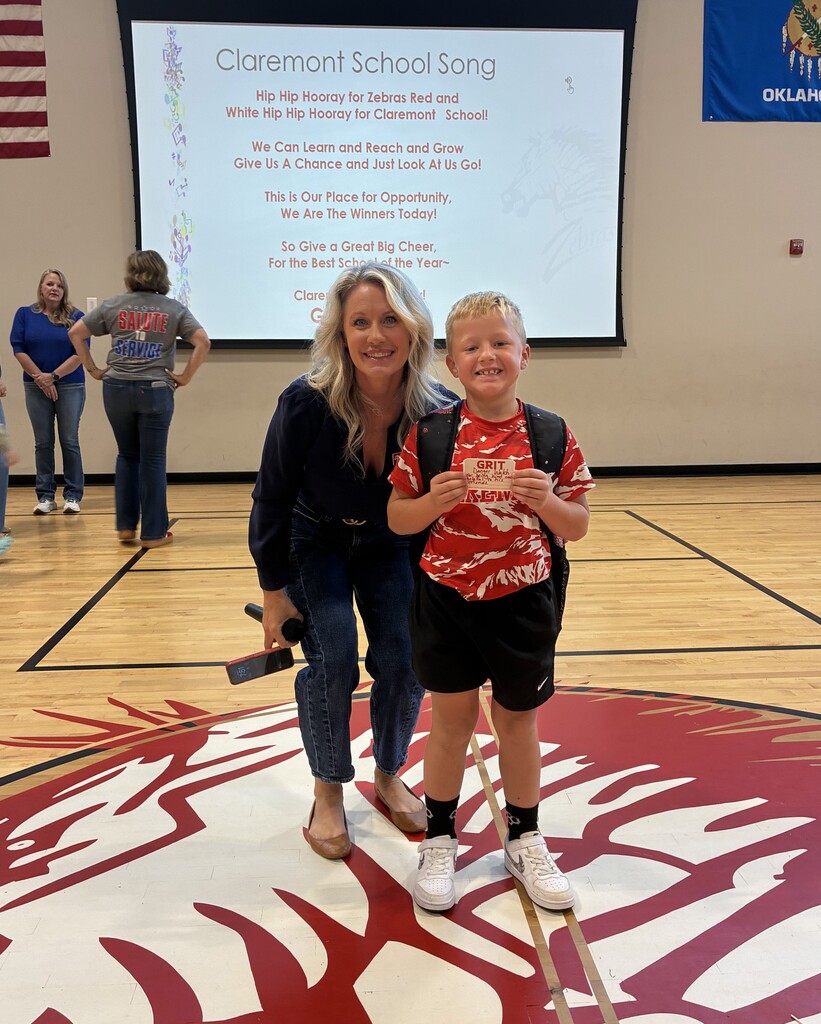 principal fay with student