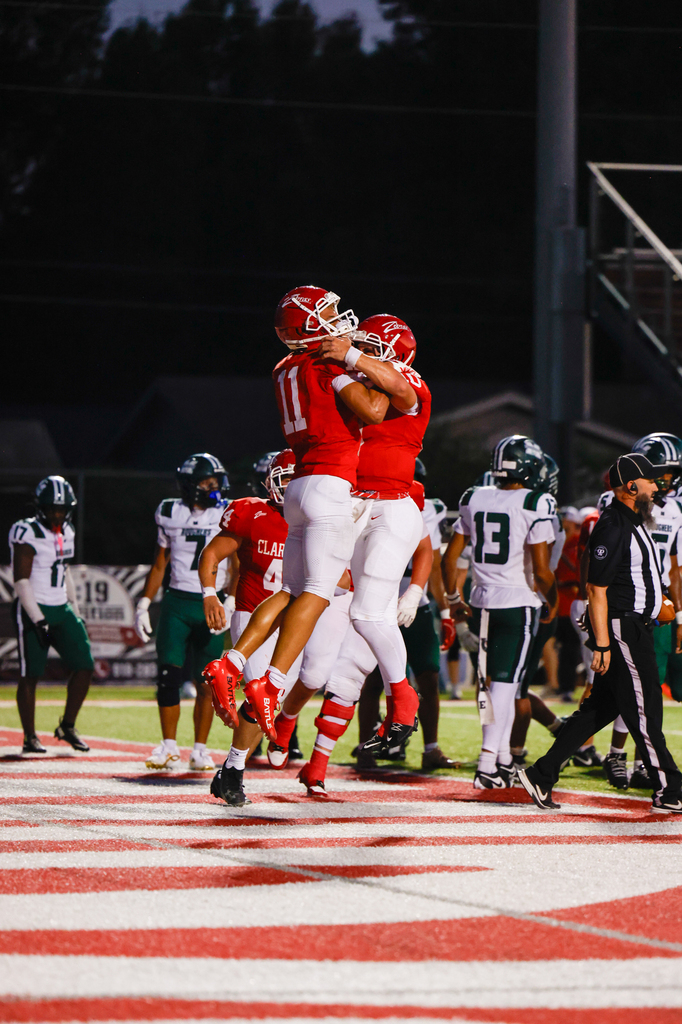 Football players celebrating after touchdown 