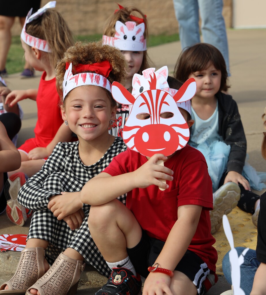 Students with zebra masks and headbands 