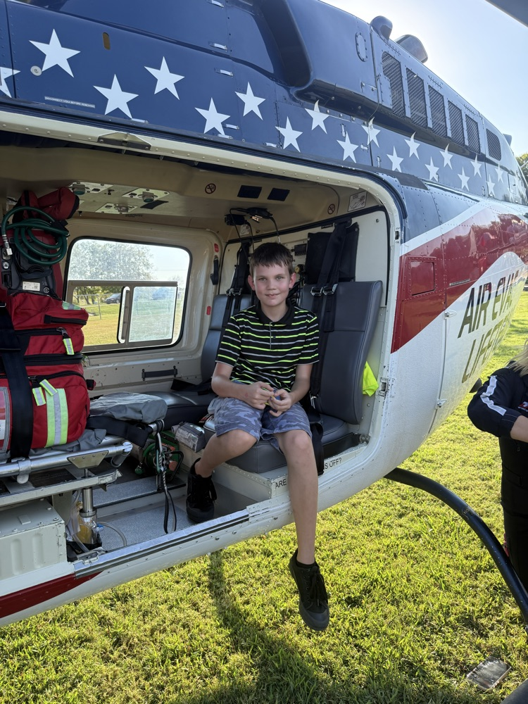 student in helicopter 