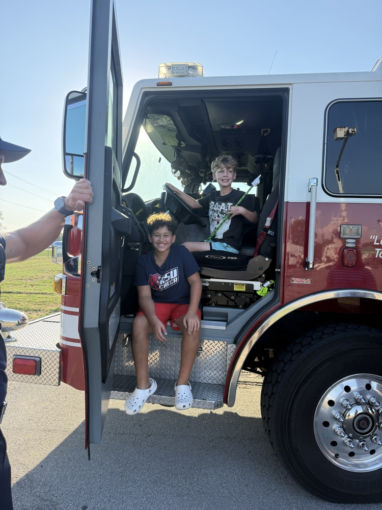 students in firetruck 