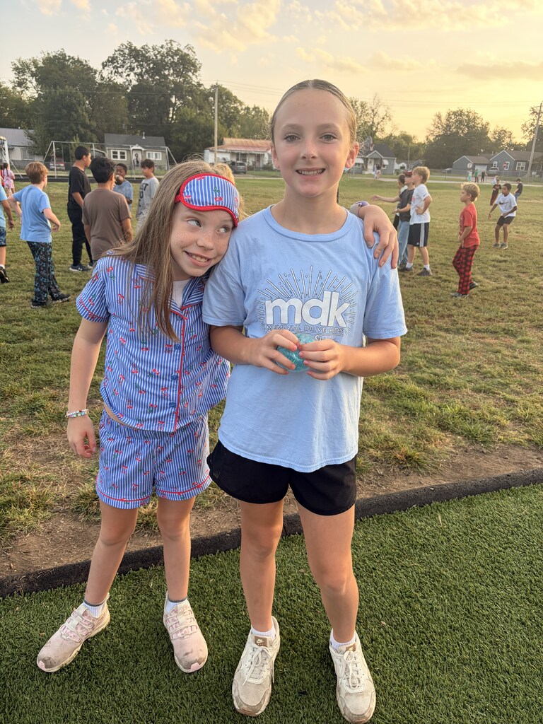 students smiling wearing pjs to school