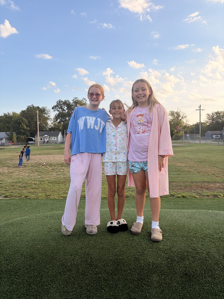 students smiling wearing pjs to school