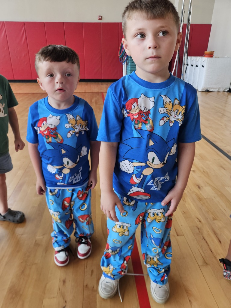 Students smiling with matching sonic pjs