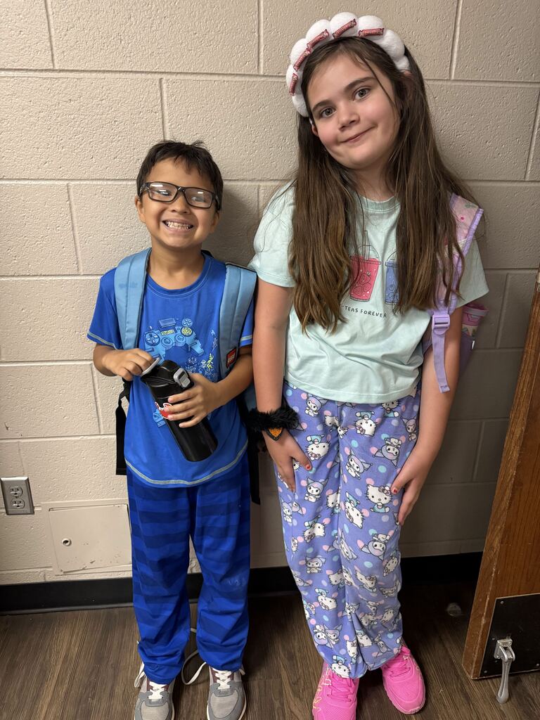 students smiling in pjs