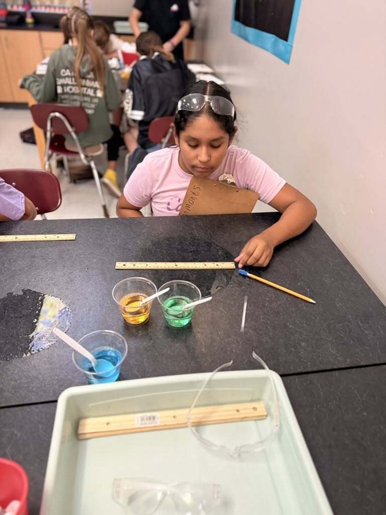 Student measuring the bubble.