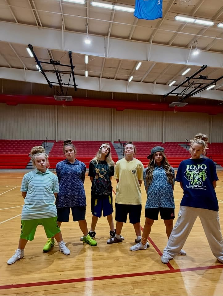 cheerleaders in basketball shorts and big T-shirts 