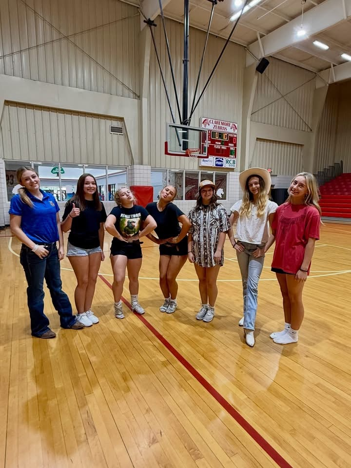cheerleaders in county outfits  