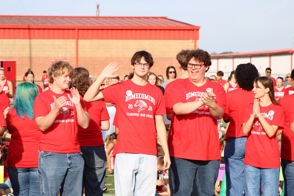 Homecoming Rep waving 