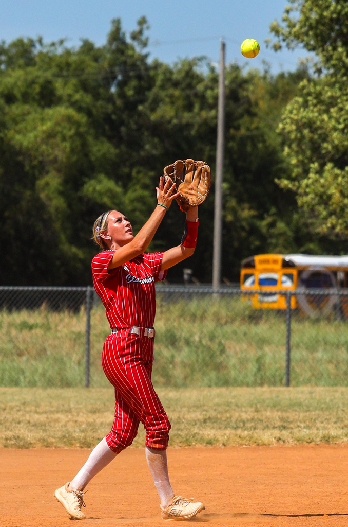 Softball Player catching the ball