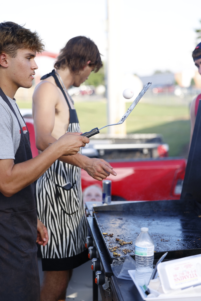 Baseball players grilling