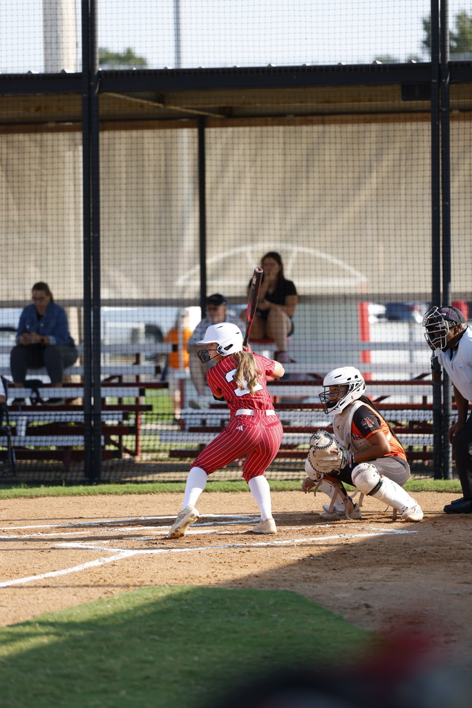 Softball player hitting