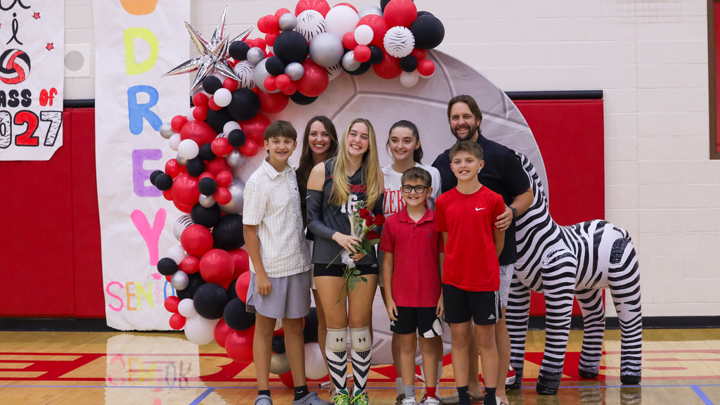 Volleyball player and her family