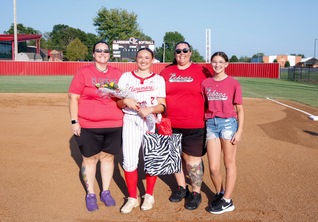 Softball player and her family