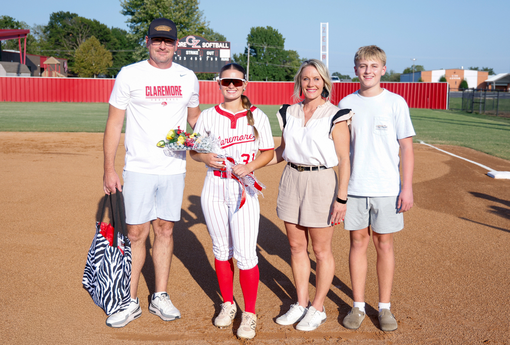 Softball player and her family