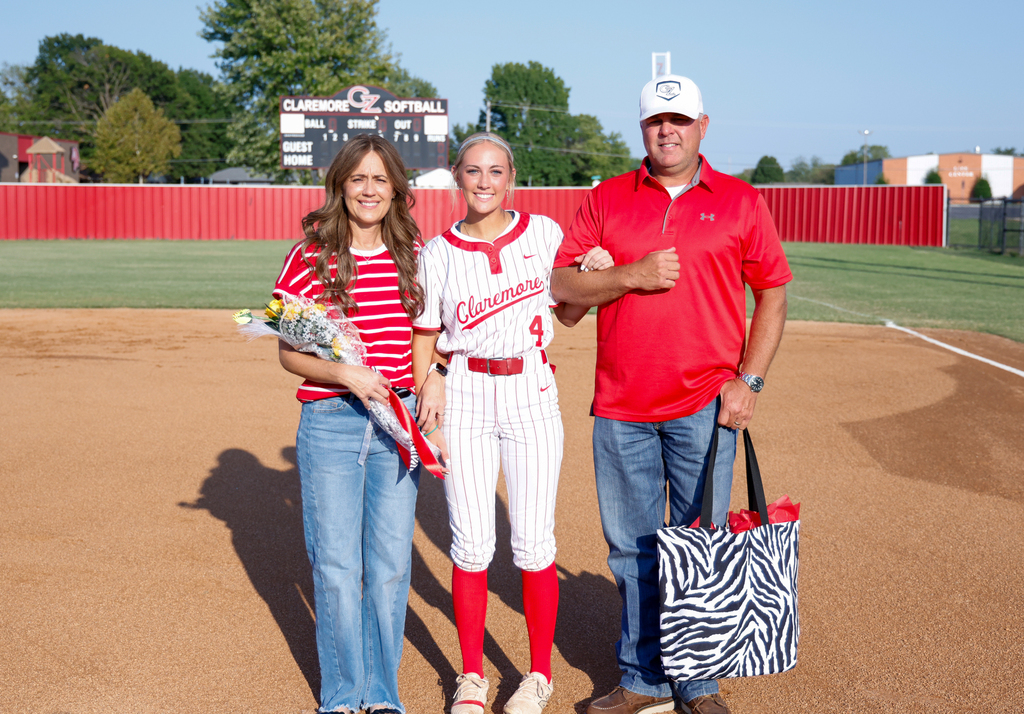 Softball player and her family