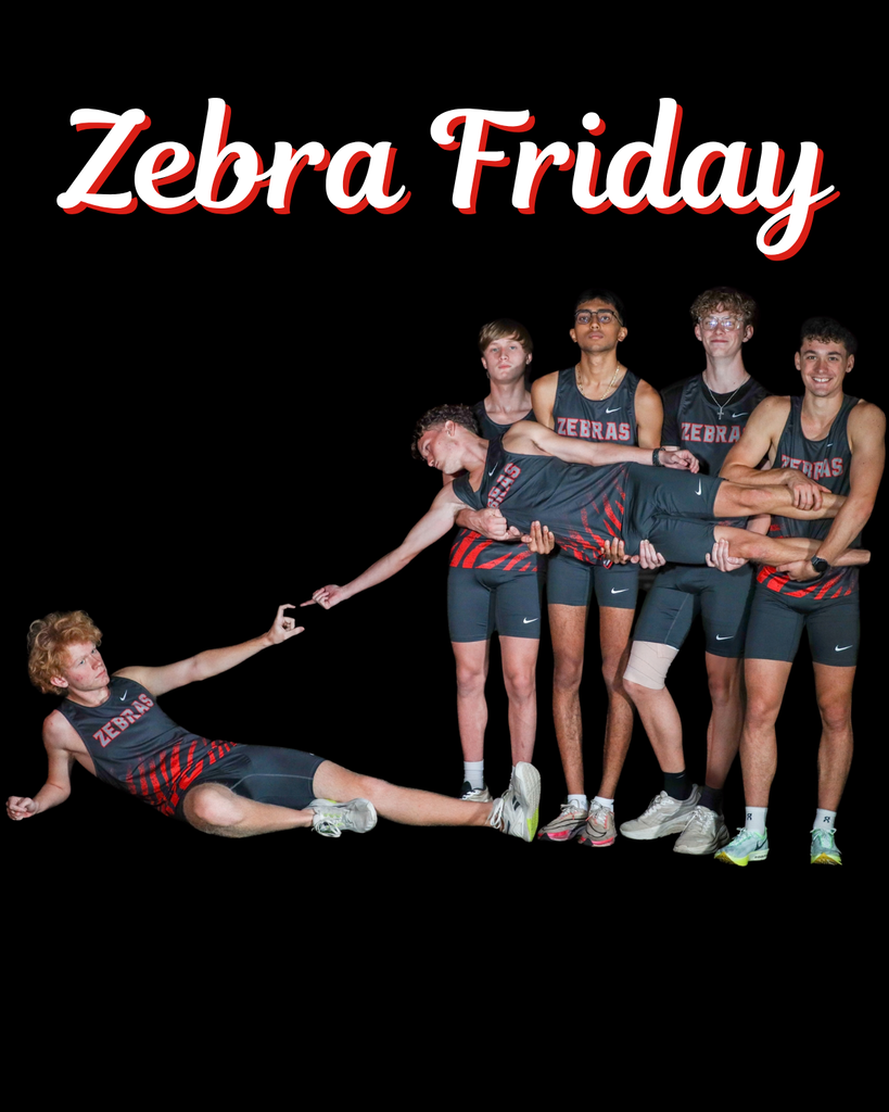 Zebra boys cross country team strikes a playful group pose.