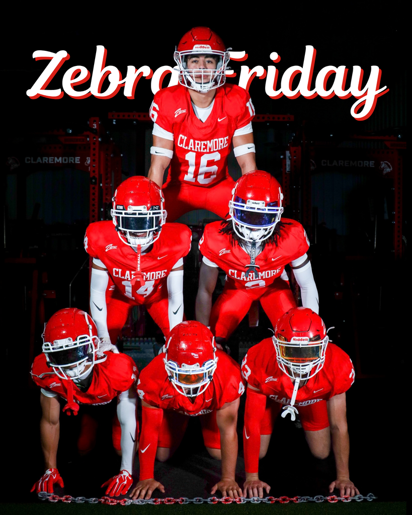ix Zebra football players pose together in red uniforms.