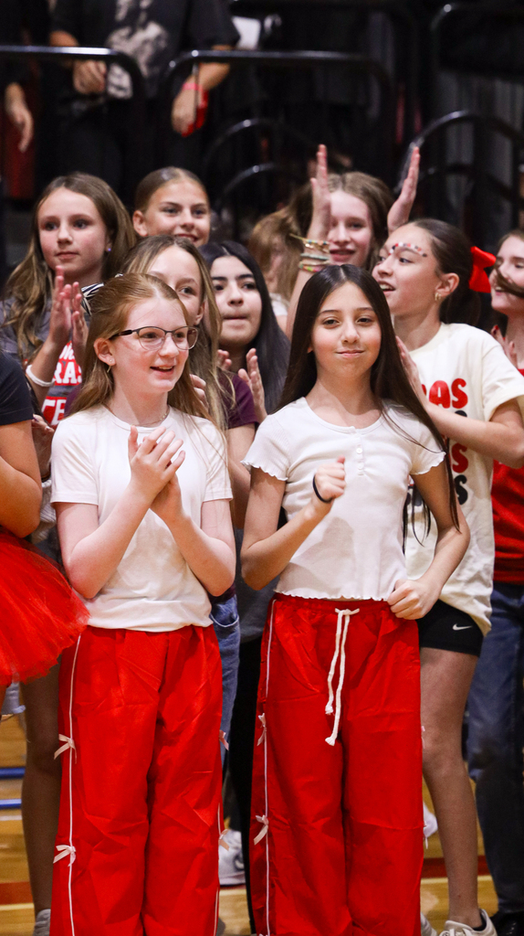 WRJH students clap and cheer during the Homecoming assembly.