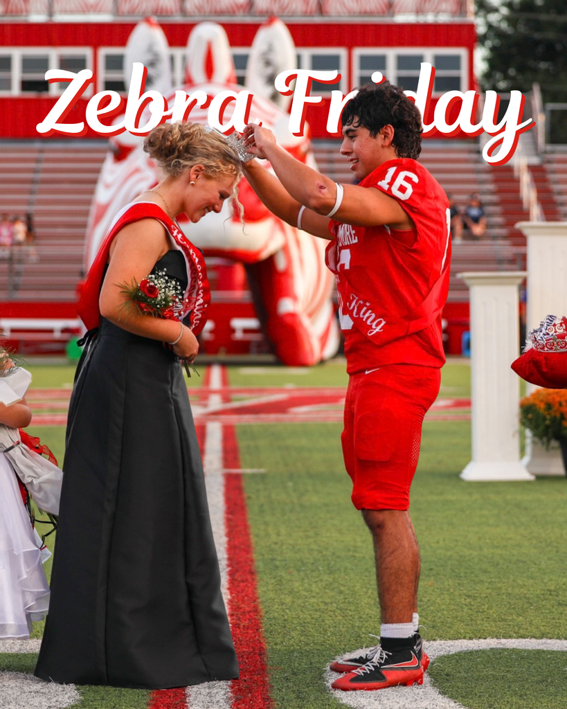 Football player crowns the Homecoming queen on the field.