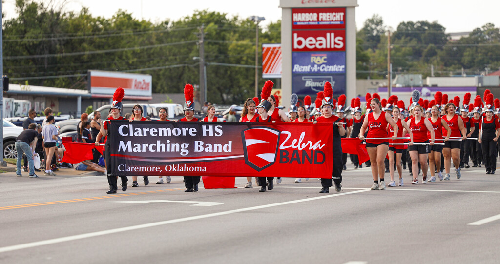 Claremore High School marching band and color guard march in the parade.