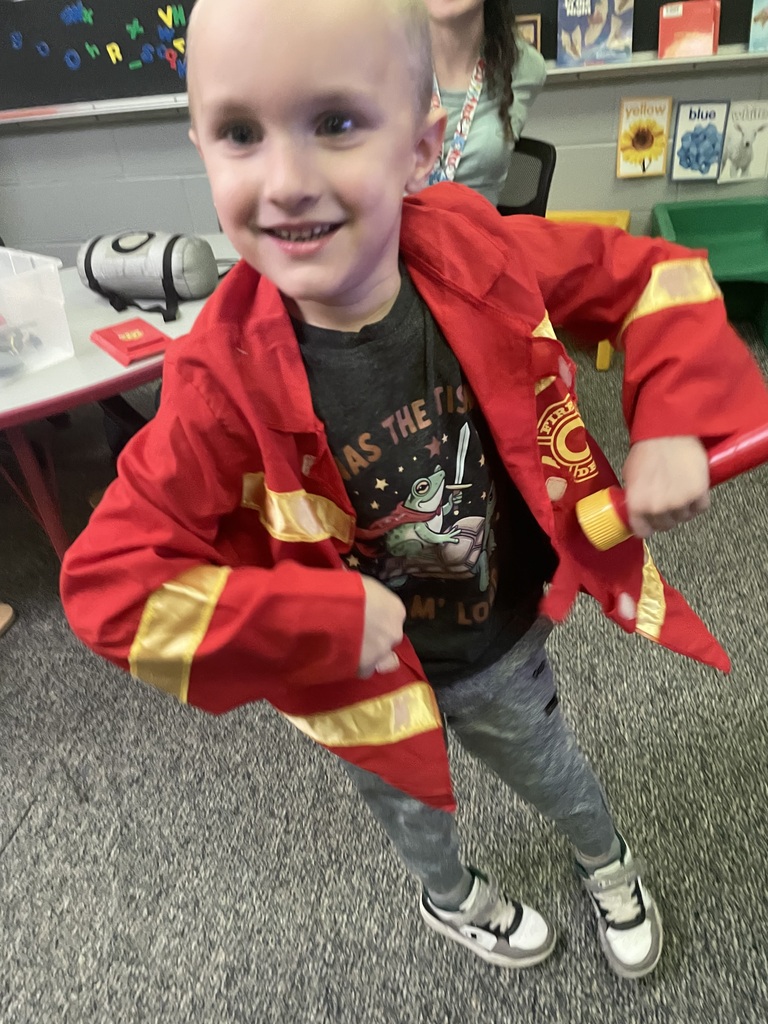 student dressed as fire fighter
