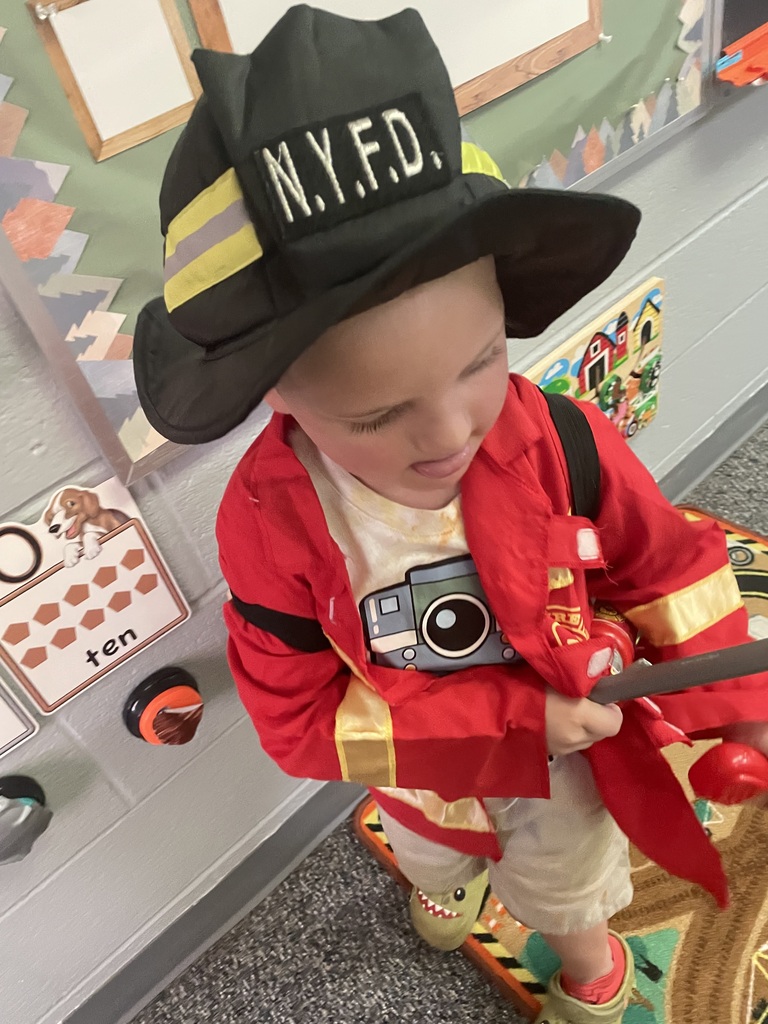 student dressed as firefighter