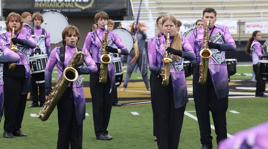 Zebra Band saxophone players perform during their competition show.
