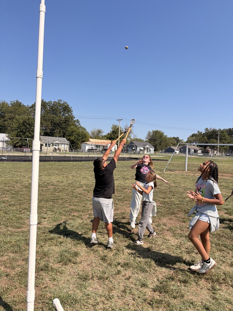 students playing Cherokee heritage days outside