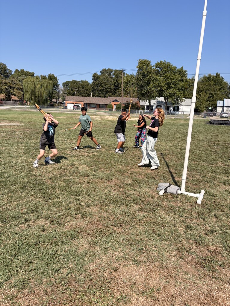 students playing Cherokee heritage days outside