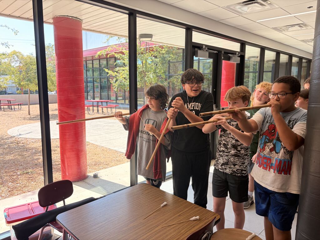 students smiling and playing Cherokee heritage games