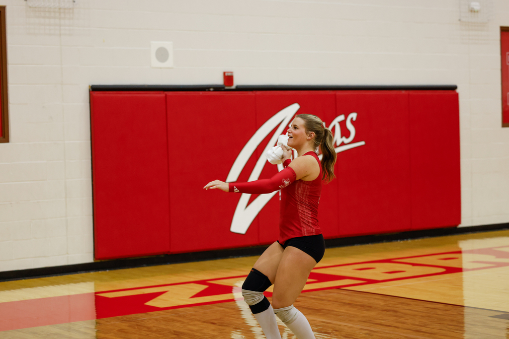 A Lady Zebra volleyball player prepares to throw a shirt.