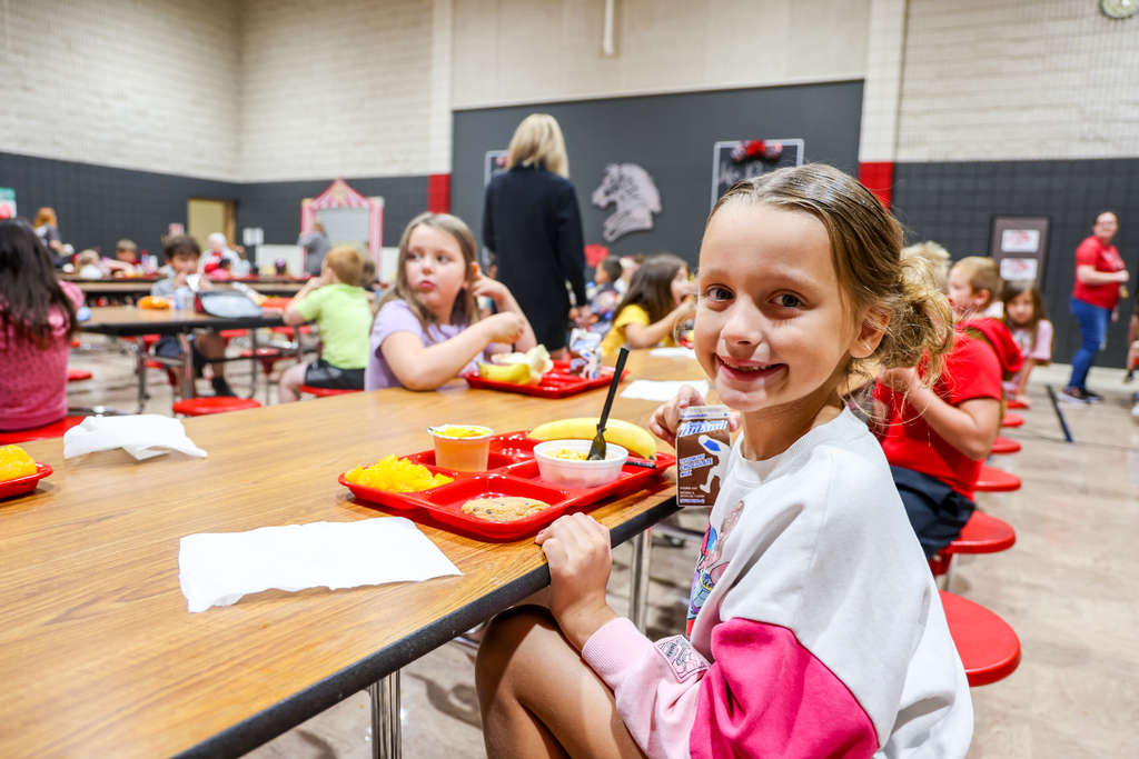 Student eating circus themed lunch