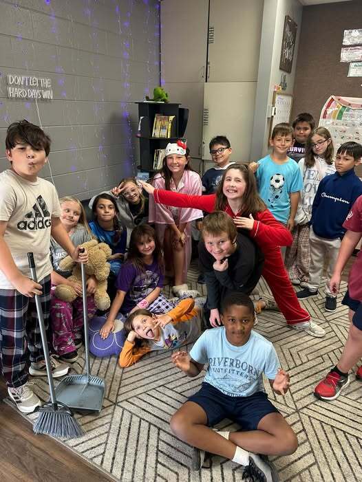 multiple students wearing blue and pjs