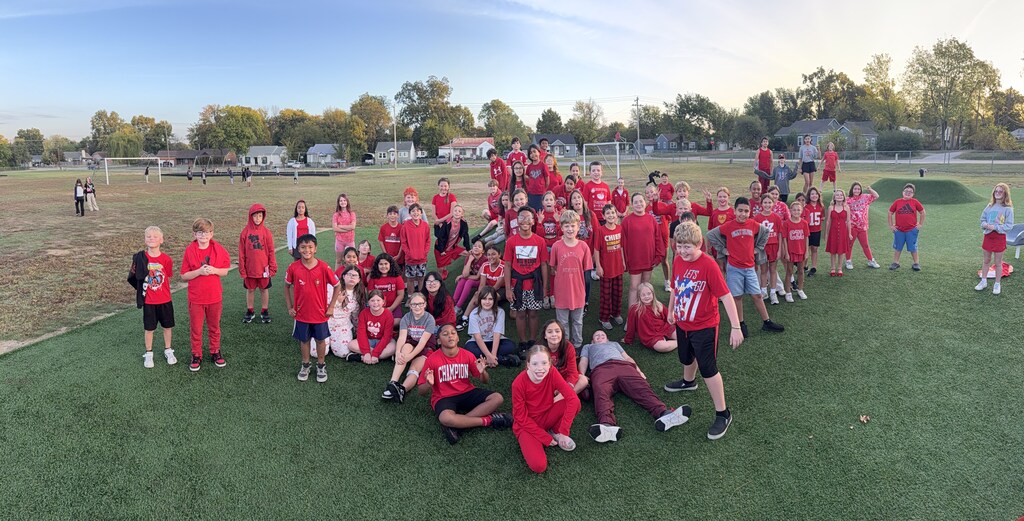 large group of students wearing all red