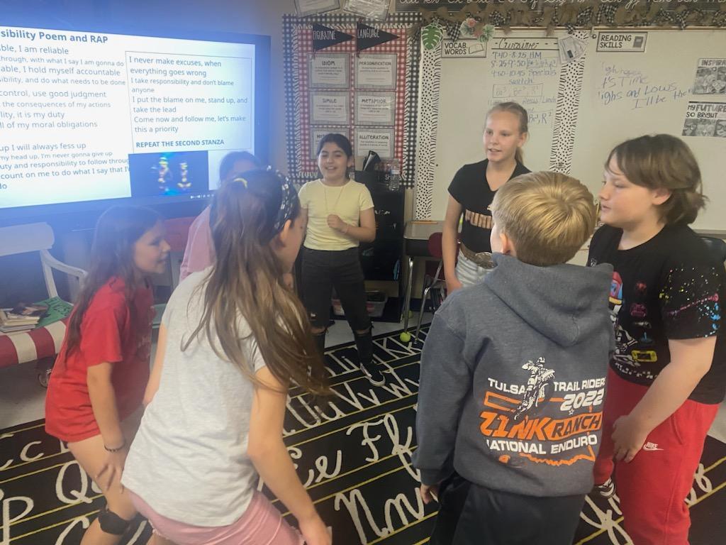 4th grade students practicing responsibility rap