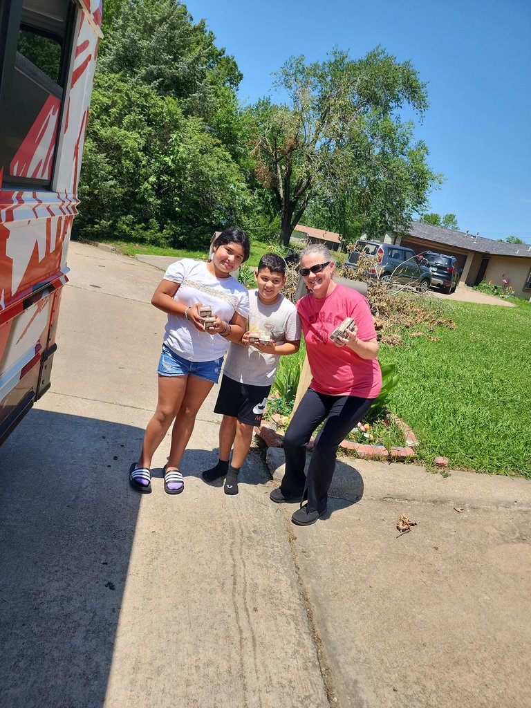 teachers and students getting food