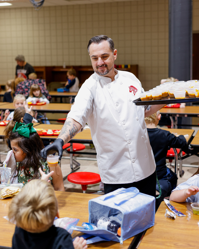 Chef Ryan serving students