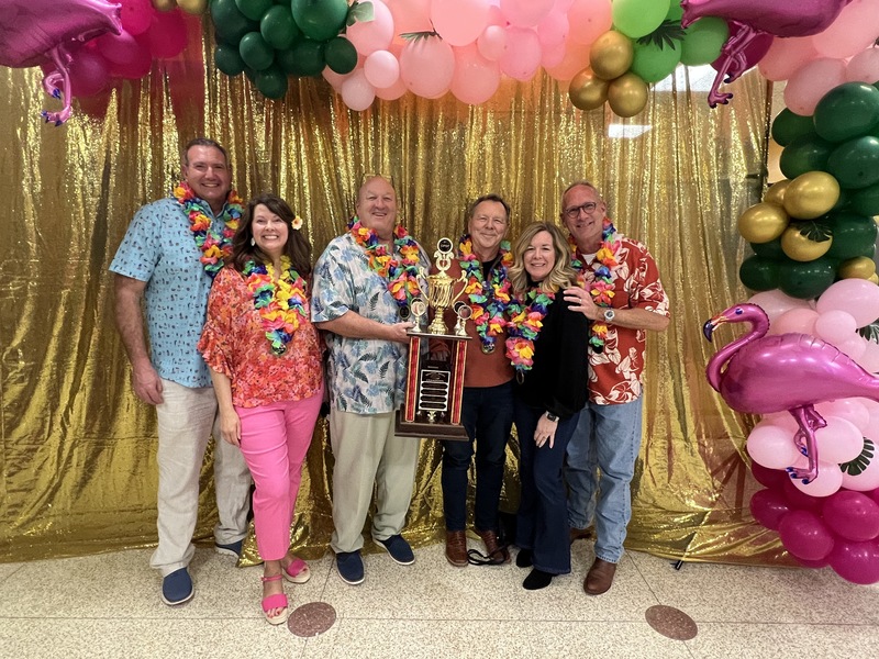 2025 Brainiac Brawl Winners with trophy