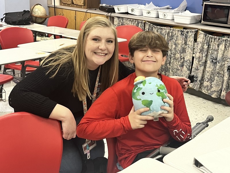 stout with student and globe project stout with student and globe project