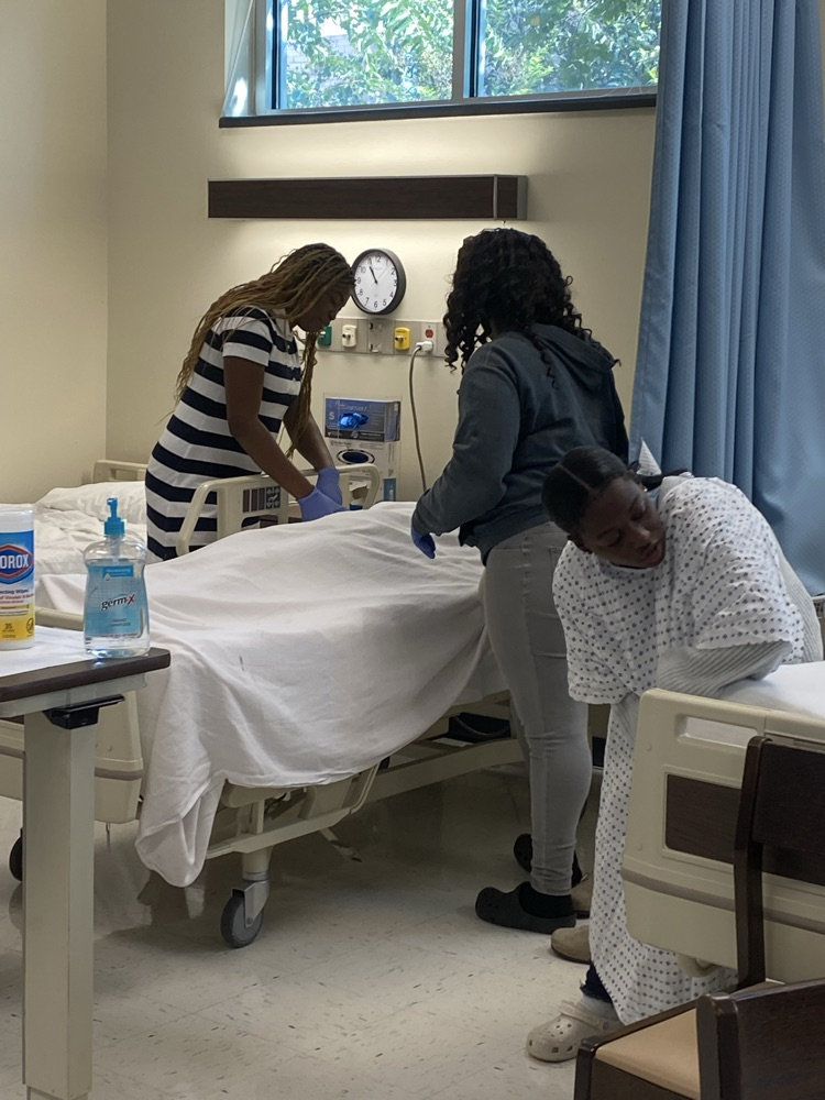 Spann Health Science I making beds