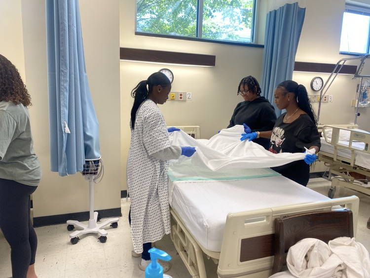 Spann Health Science I making beds