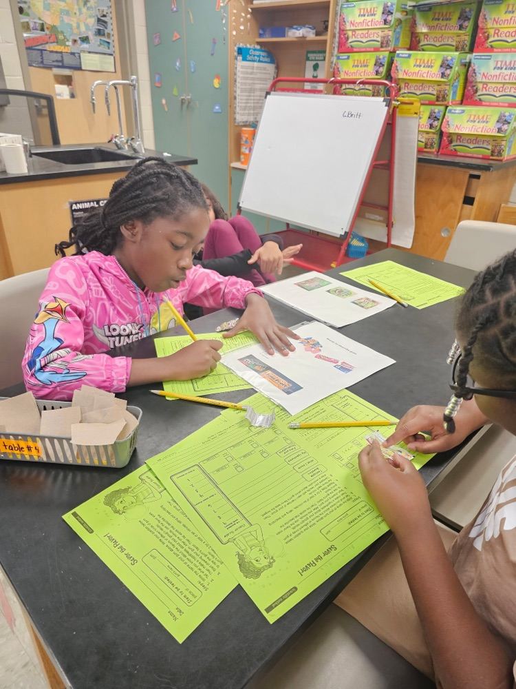 Mrs. C. Britt engages her scholars in a “Savor the Flavor” experiment during STEM LAB. 