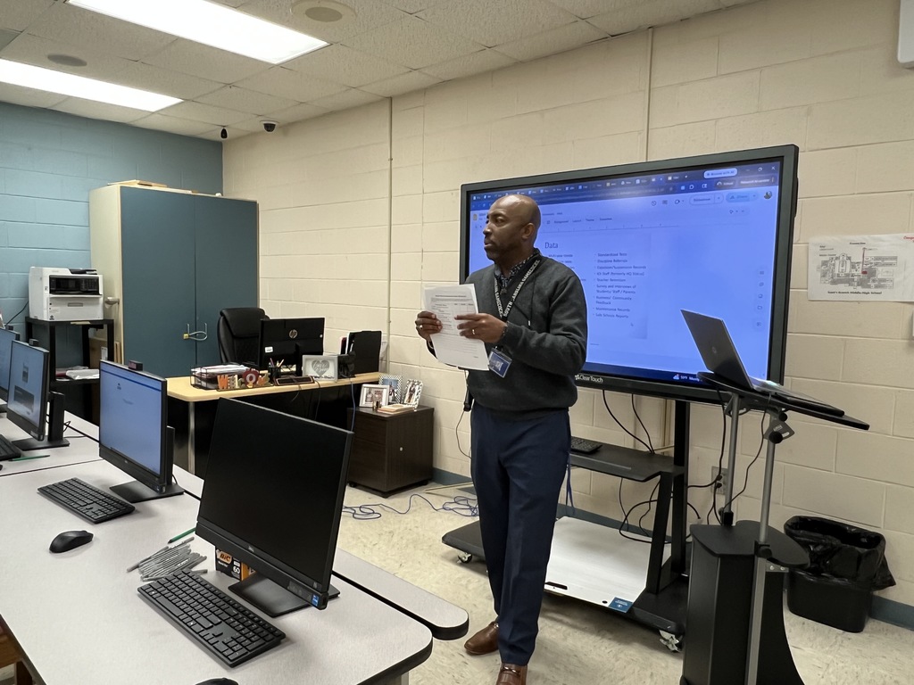 Dr. Cummings presenting information about Title 1