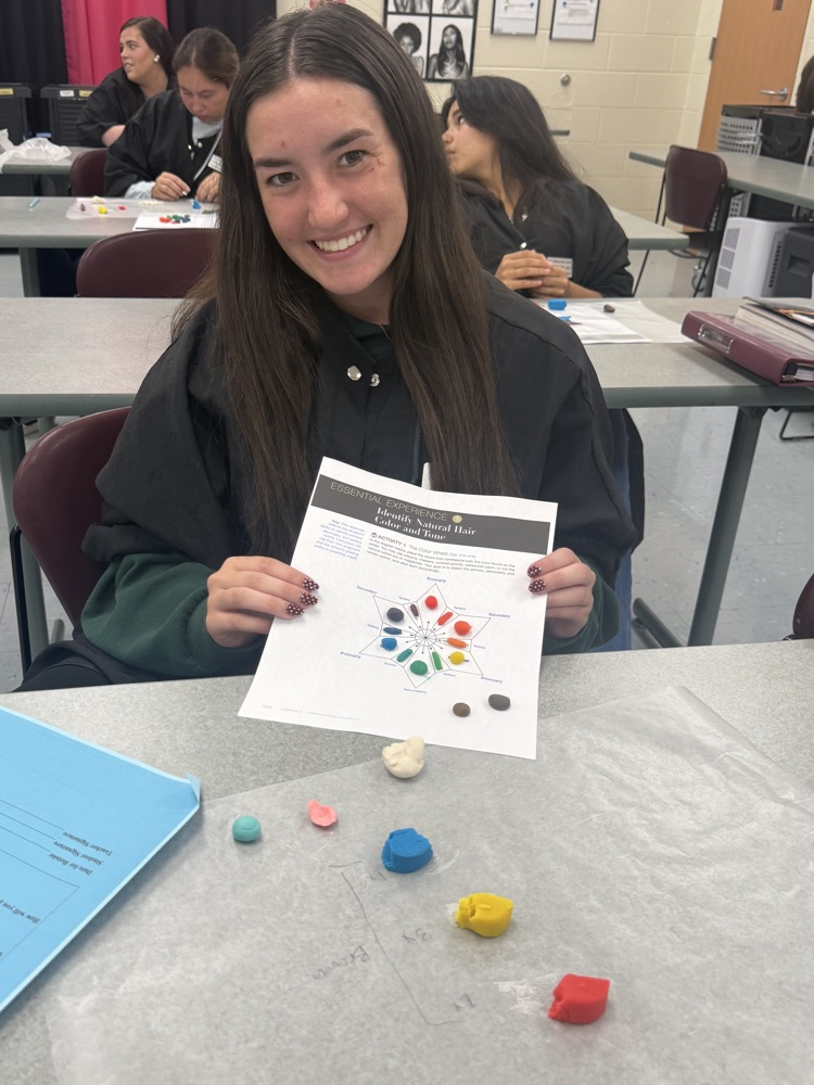 Mrs. Graham’s Cosmetology Student Learning Color Theory in Cosmetology