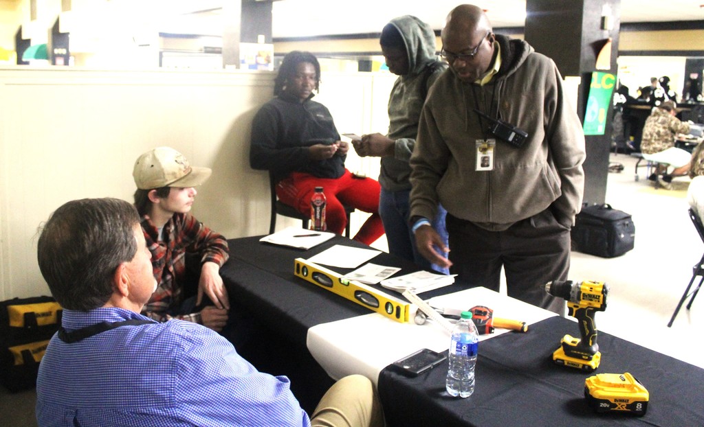 Dr. Samuels speaking with Mr. Griffin