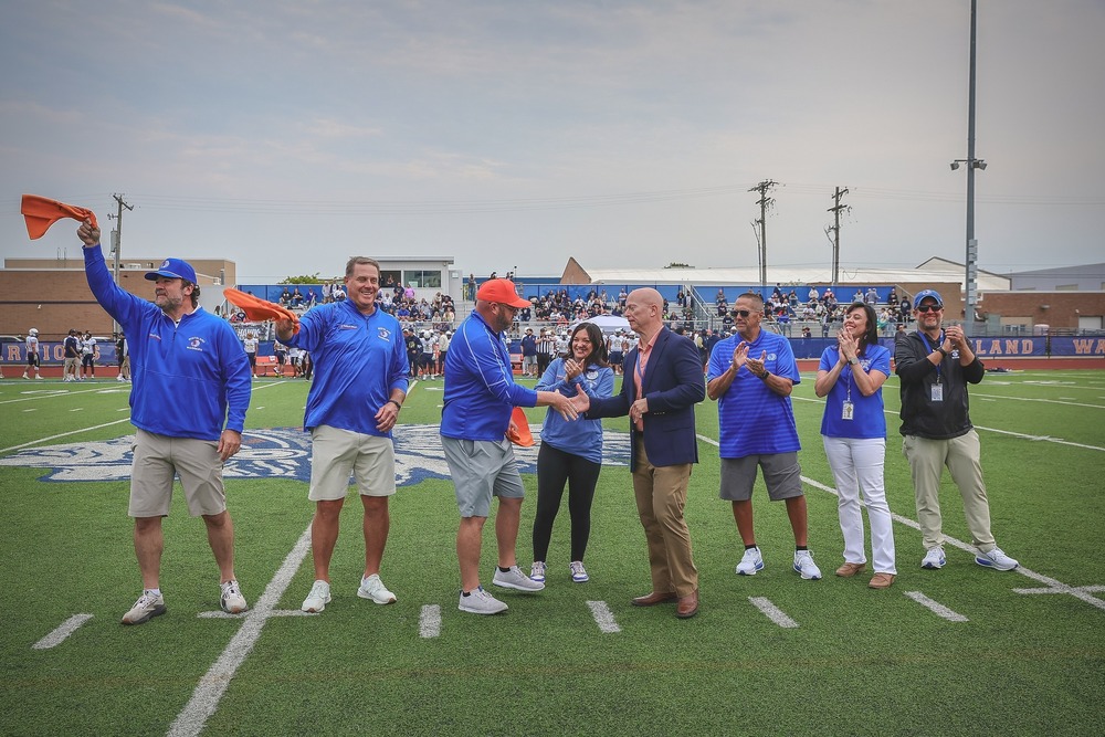 Bailey and Wood Dedication Handshake
