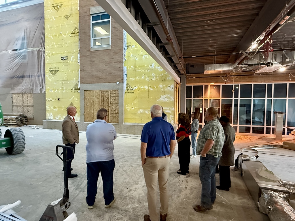 School Board Members touring high school