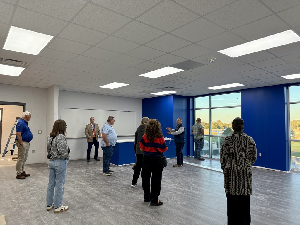 School Board Members touring high school