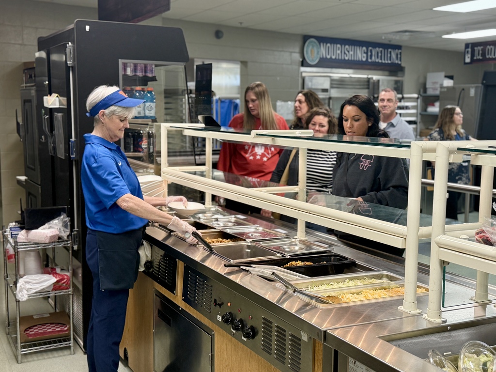 Donna serving burrito bowls